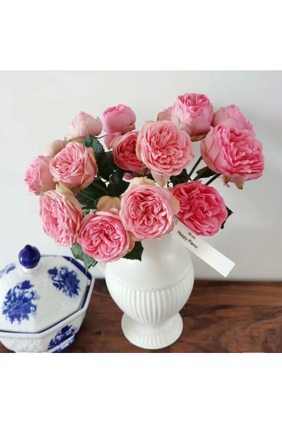 Букет троянд сорту Happy Piano у вазі